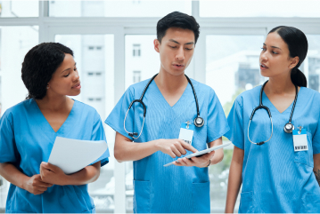 Three nurses talking